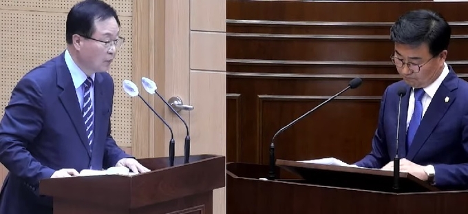 유희태 군수(왼쪽)가 유의식 의원의 질의에 답변 중이다.