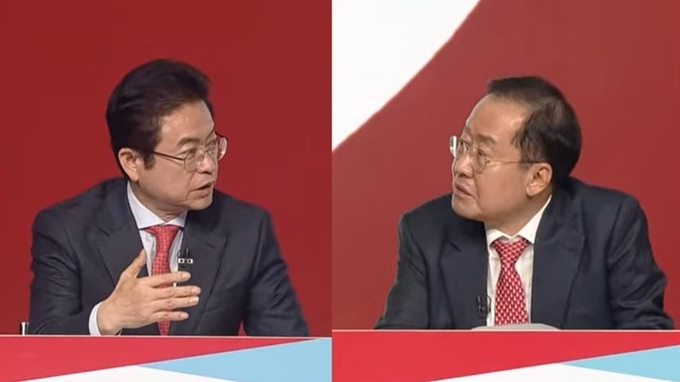 지난 20일 열린 국민의힘 경선 토론회에 참여한 이철우 경북지사(왼쪽)와 홍준표 전 대구시장